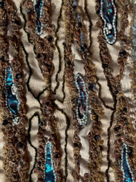 detalle bordado a mano alta costura técnicas textiles